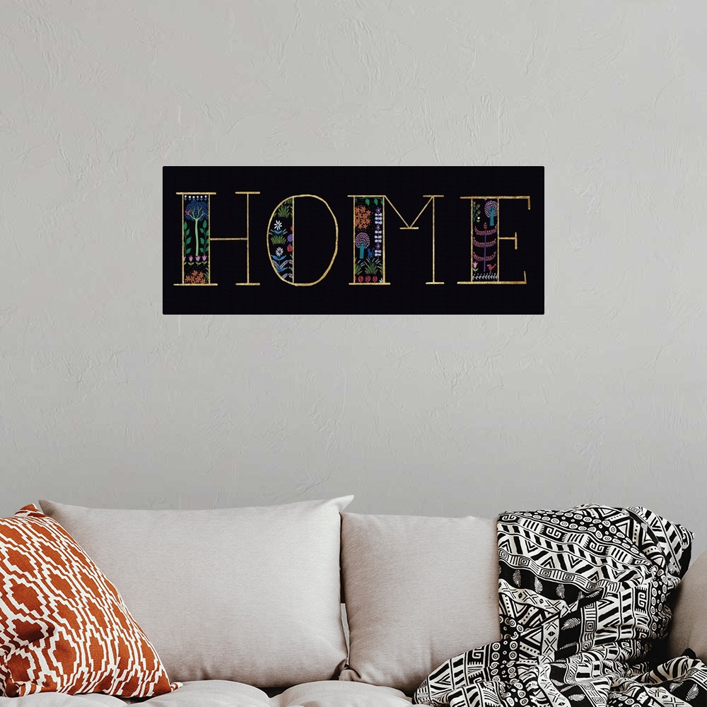 A bohemian room featuring "HOME" with a floral design on a black background.