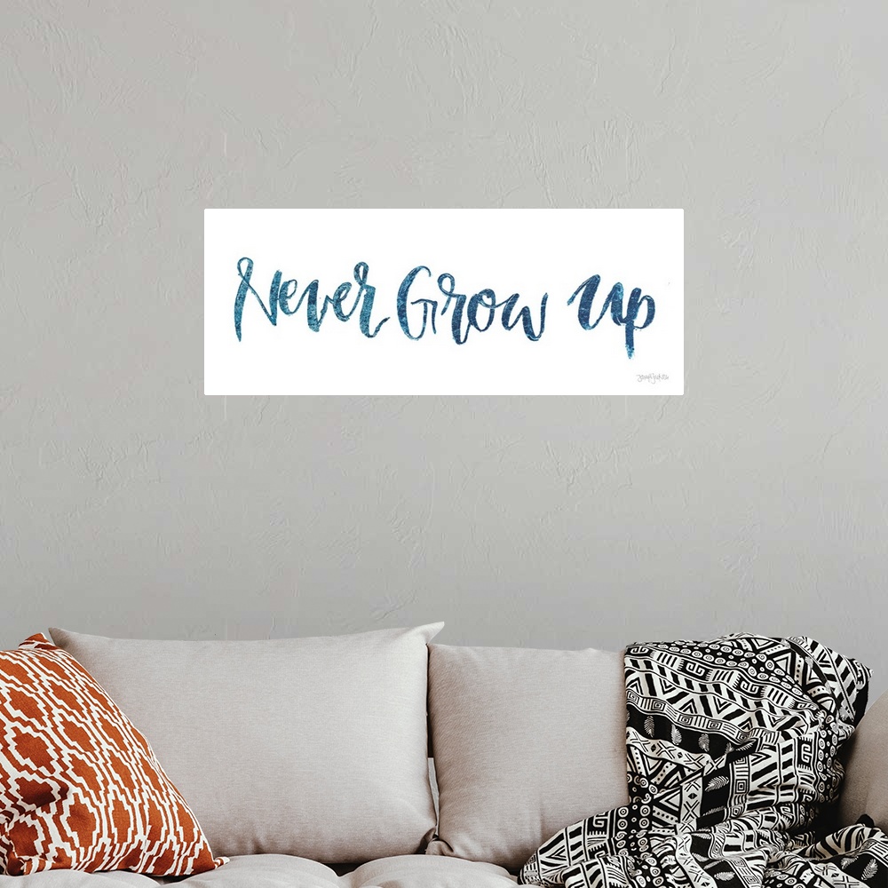 A bohemian room featuring "Never Give Up" handwritten in blue on a white background.