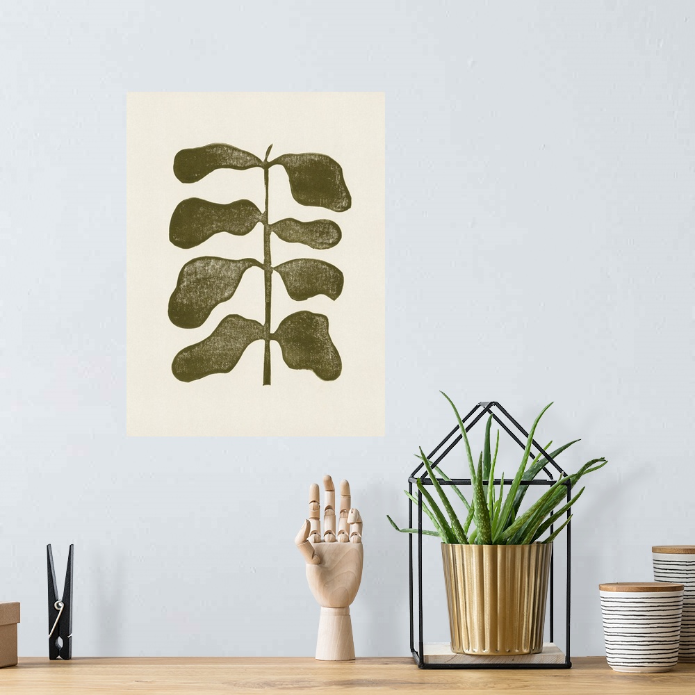 A bohemian room featuring A very simple but impactful linocut print of a single olive green plant with large leaves. Suitab...