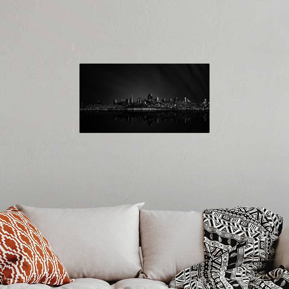 A bohemian room featuring Black and white skyline of San Francisco, California, at night.