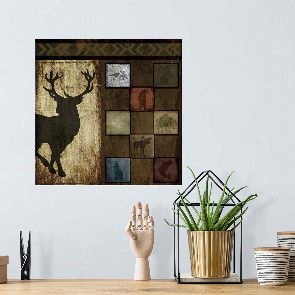 A bohemian room featuring Artwork of a silhouette of a stag next to tiles of other animal silhouettes.