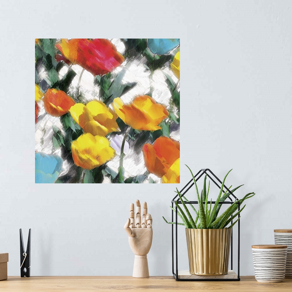 A bohemian room featuring A bright and colorful abstract painting of yellow, orange, red, and blue flowers on a white backg...