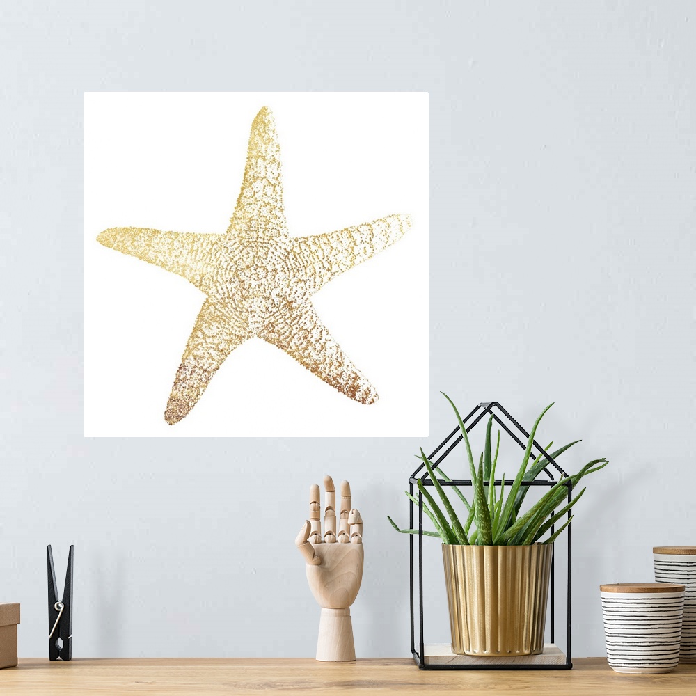 A bohemian room featuring A gold foil starfish design on a white background.