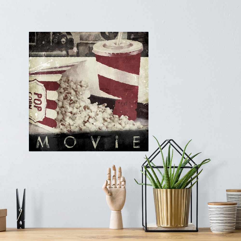 A bohemian room featuring A vintage square theater art piece with the word ?Movie? at painted the bottom.�