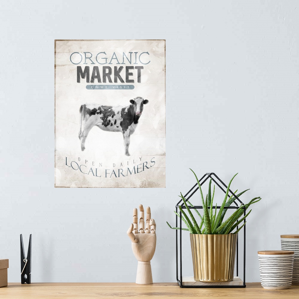 A bohemian room featuring "Organic Market, Come Visit, Open Daily, Local Farmers" with an image of a cow.