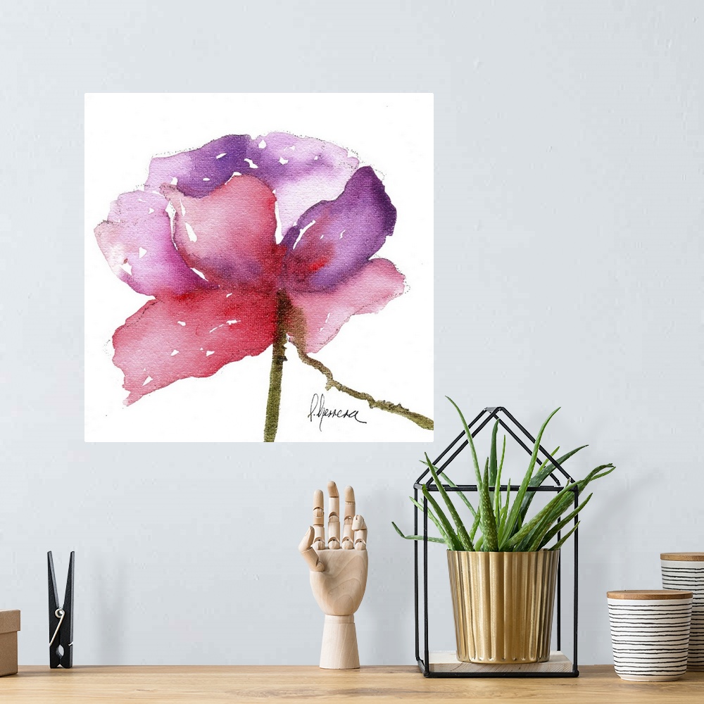 A bohemian room featuring Contemporary watercolor painting of a vibrant pink flower against a white background.