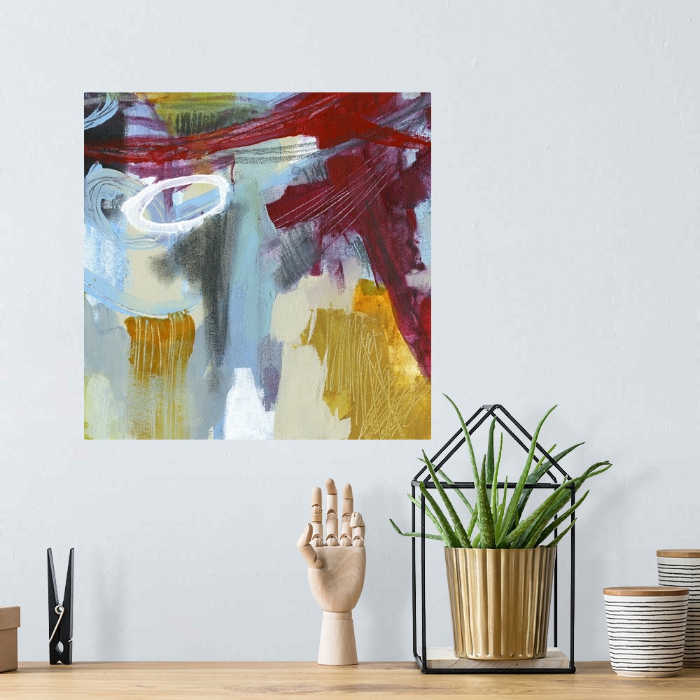 A bohemian room featuring Abstract painting using vibrant colors and harsh strokes that convey depth and movement.