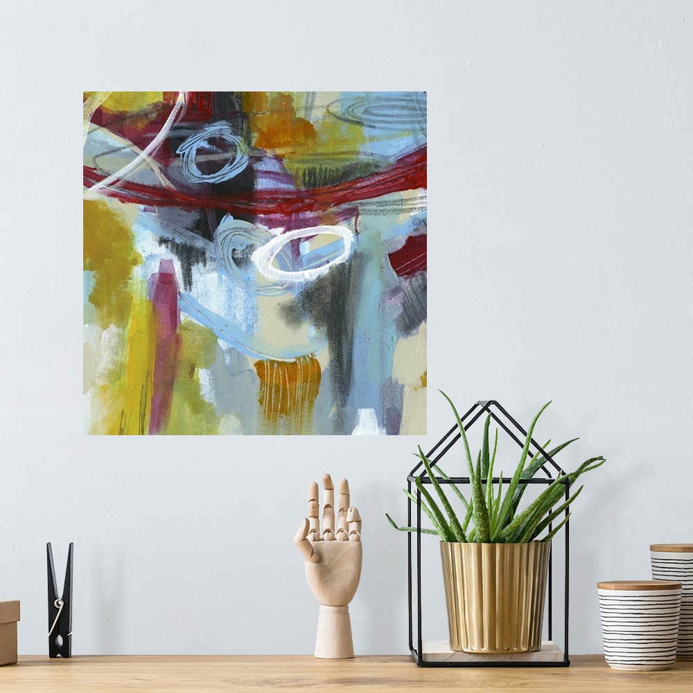 A bohemian room featuring Abstract painting using vibrant colors and harsh strokes that convey depth and movement.
