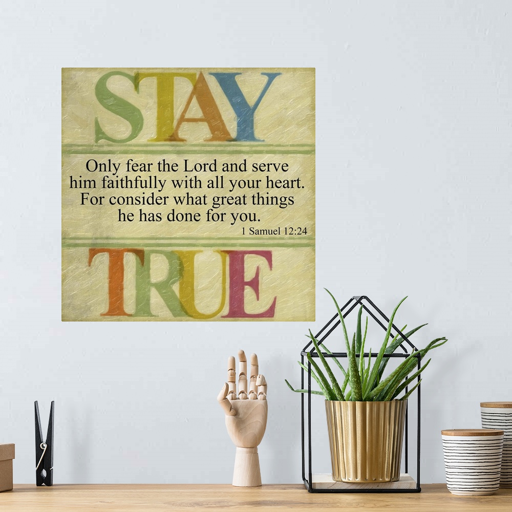 A bohemian room featuring Bible verse I Samuel 12:24 framed by letters in rainbow colors.