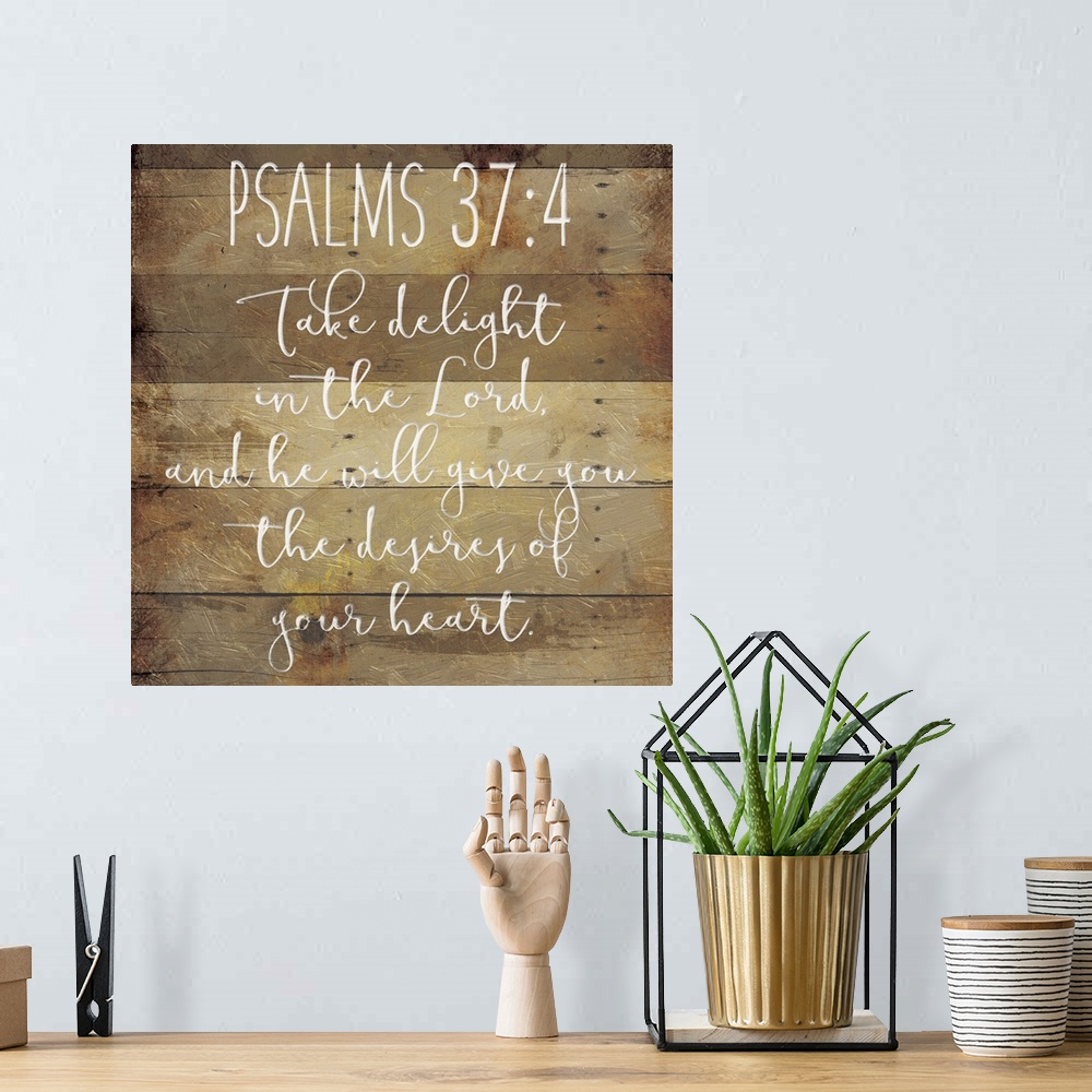 A bohemian room featuring Typography art of the Bible verse Psalms 37:4.