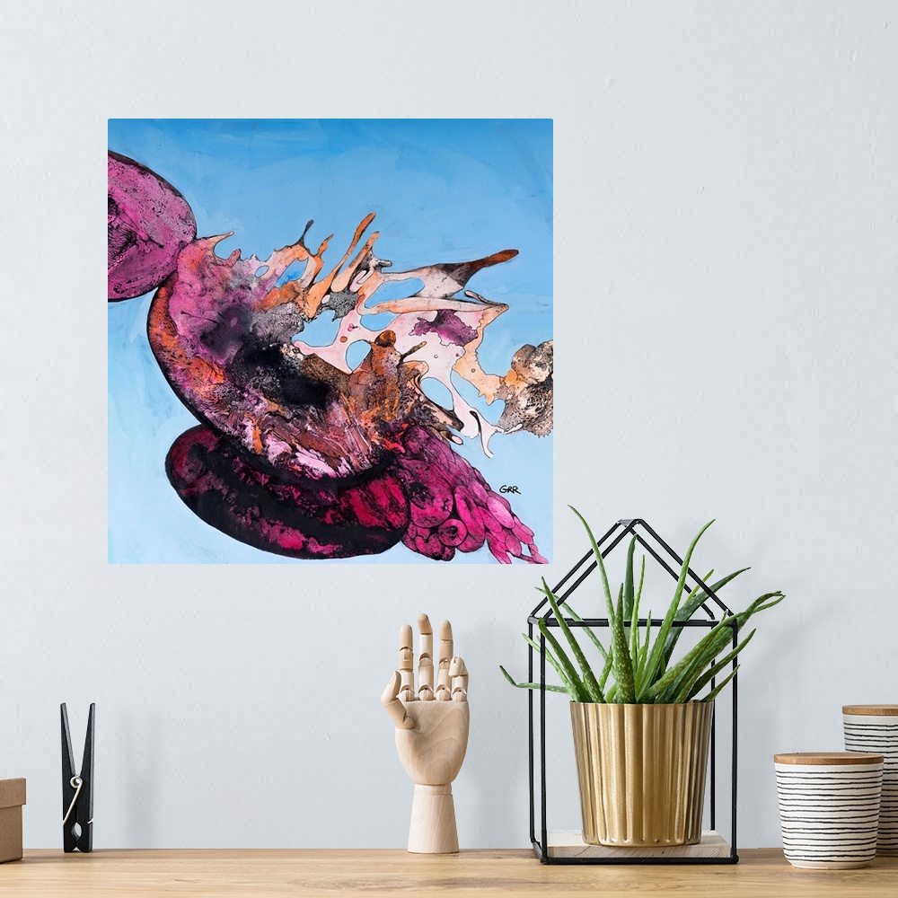 A bohemian room featuring Abstract illustration in bright pink on a blue background.