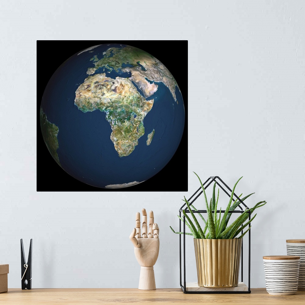 A bohemian room featuring Globe Africa, True Colour Satellite Image. Earth. True colour satellite image of the Earth, centr...
