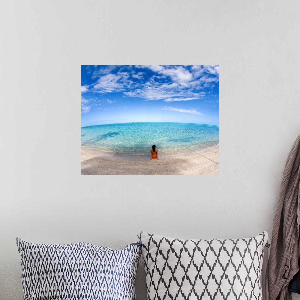 A bohemian room featuring Hawaii, Woman Laying On The Beach In Remote Tropical Location