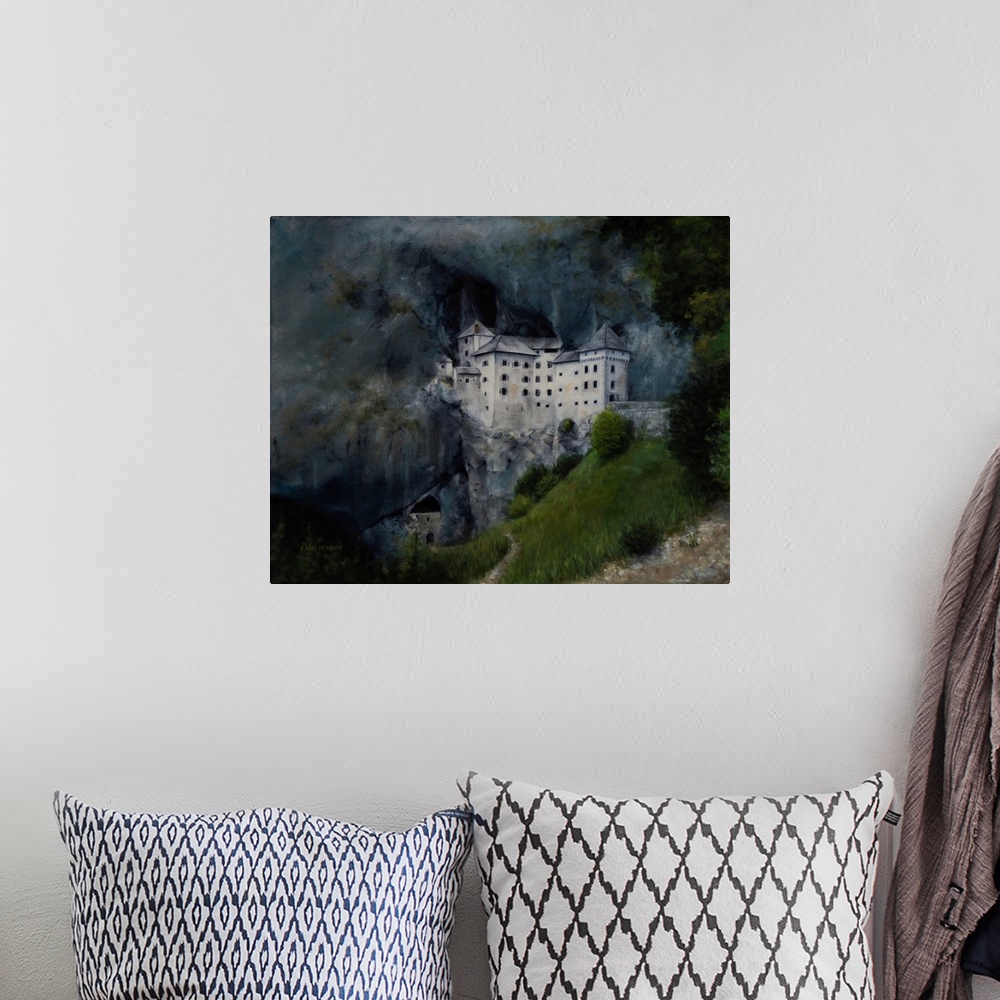 A bohemian room featuring Oil painting of Predjama castle, Slovenia.