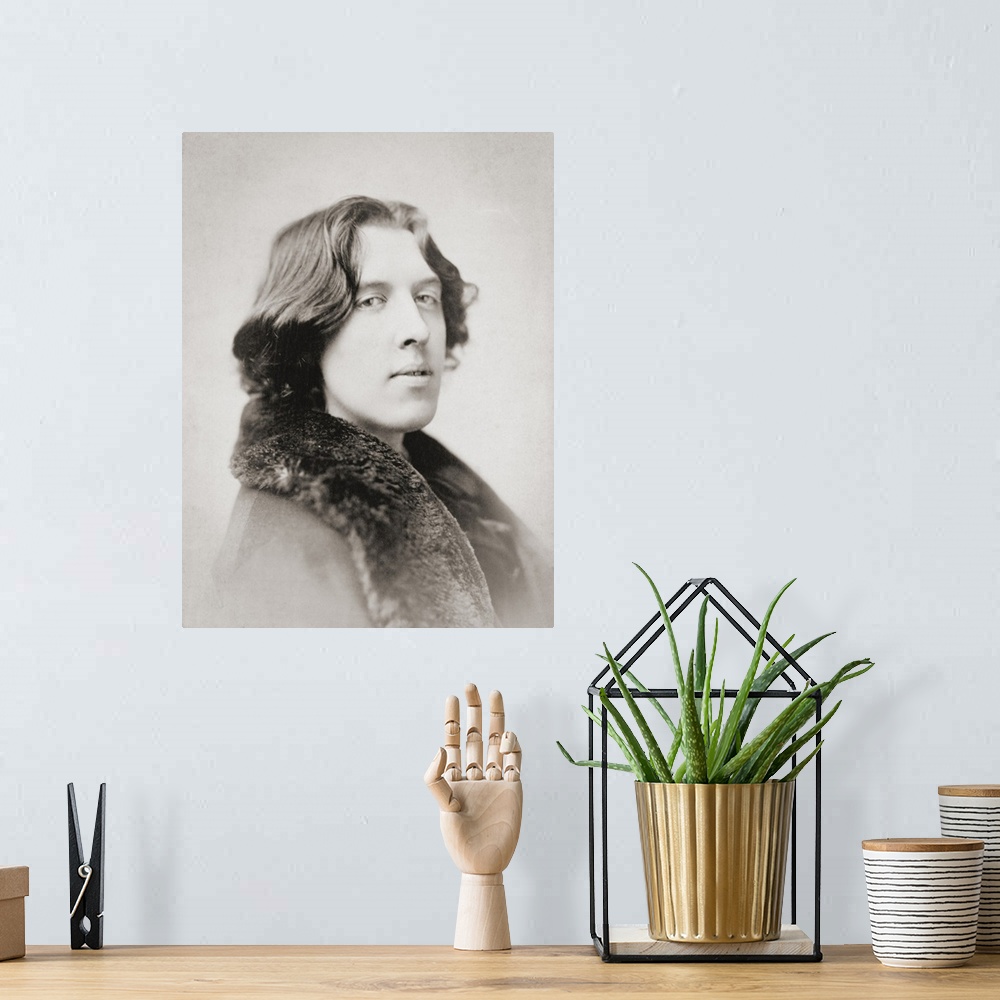 A bohemian room featuring Oscar Wilde, 1854 - 1900. Irish poet and playwright. After a photogaph made in the early 1880's b...