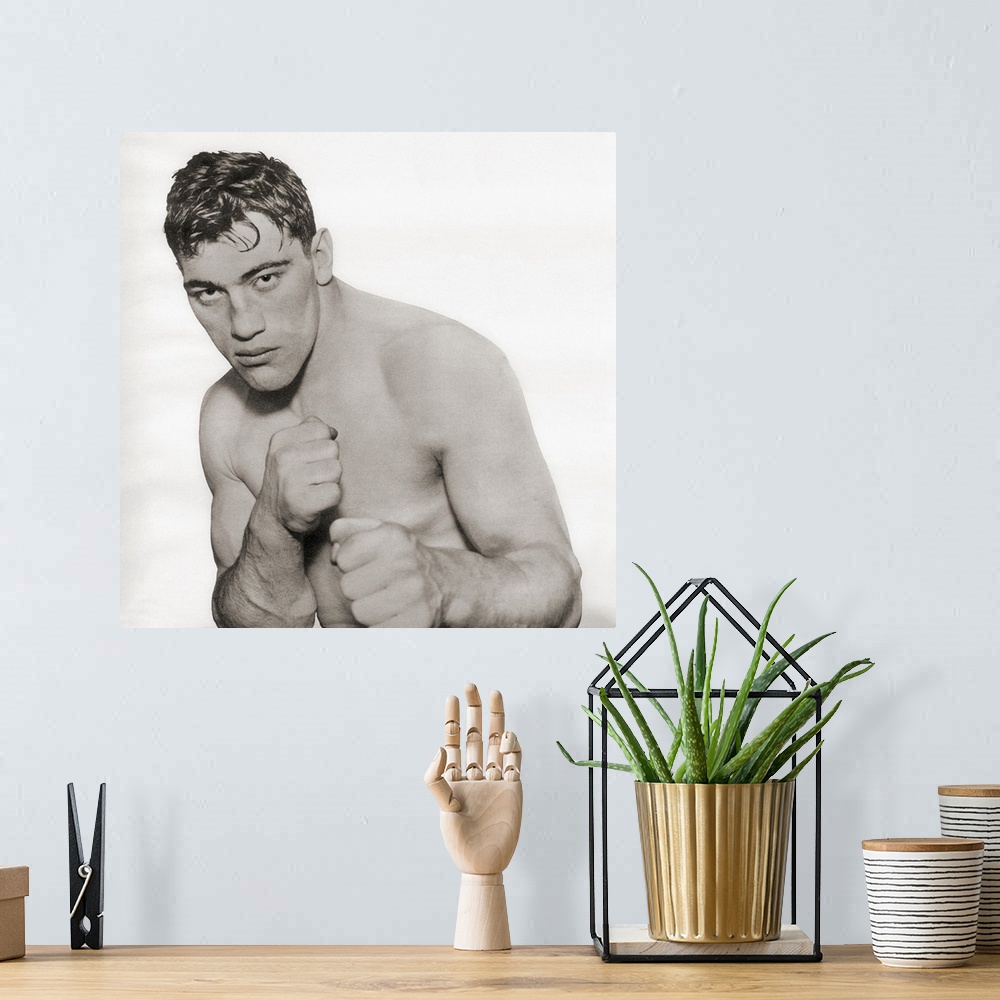 A bohemian room featuring Primo Carnera, 1906 - 1967, nicknamed the Ambling Alp. Italian professional boxer and the World H...