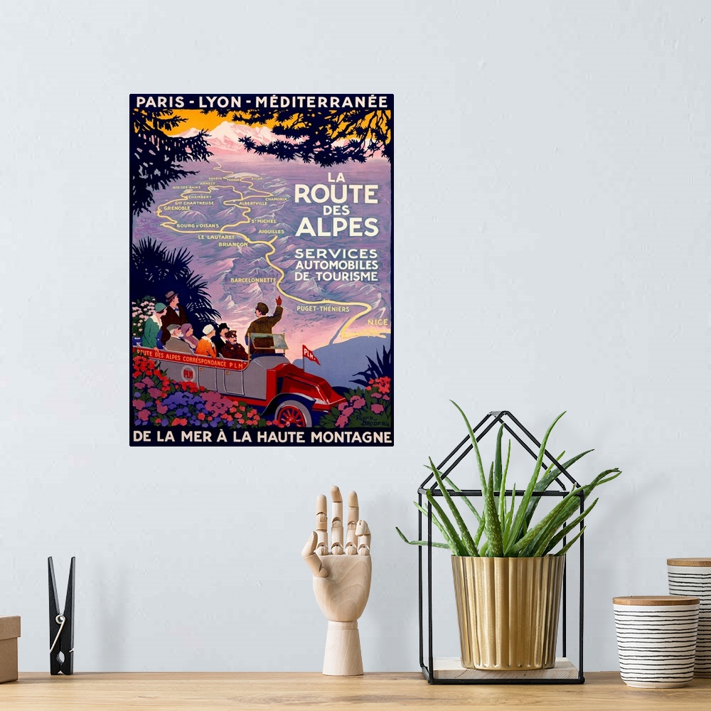 A bohemian room featuring This is a retro travel poster of a tour guide pointing out a map through the mountains of France ...