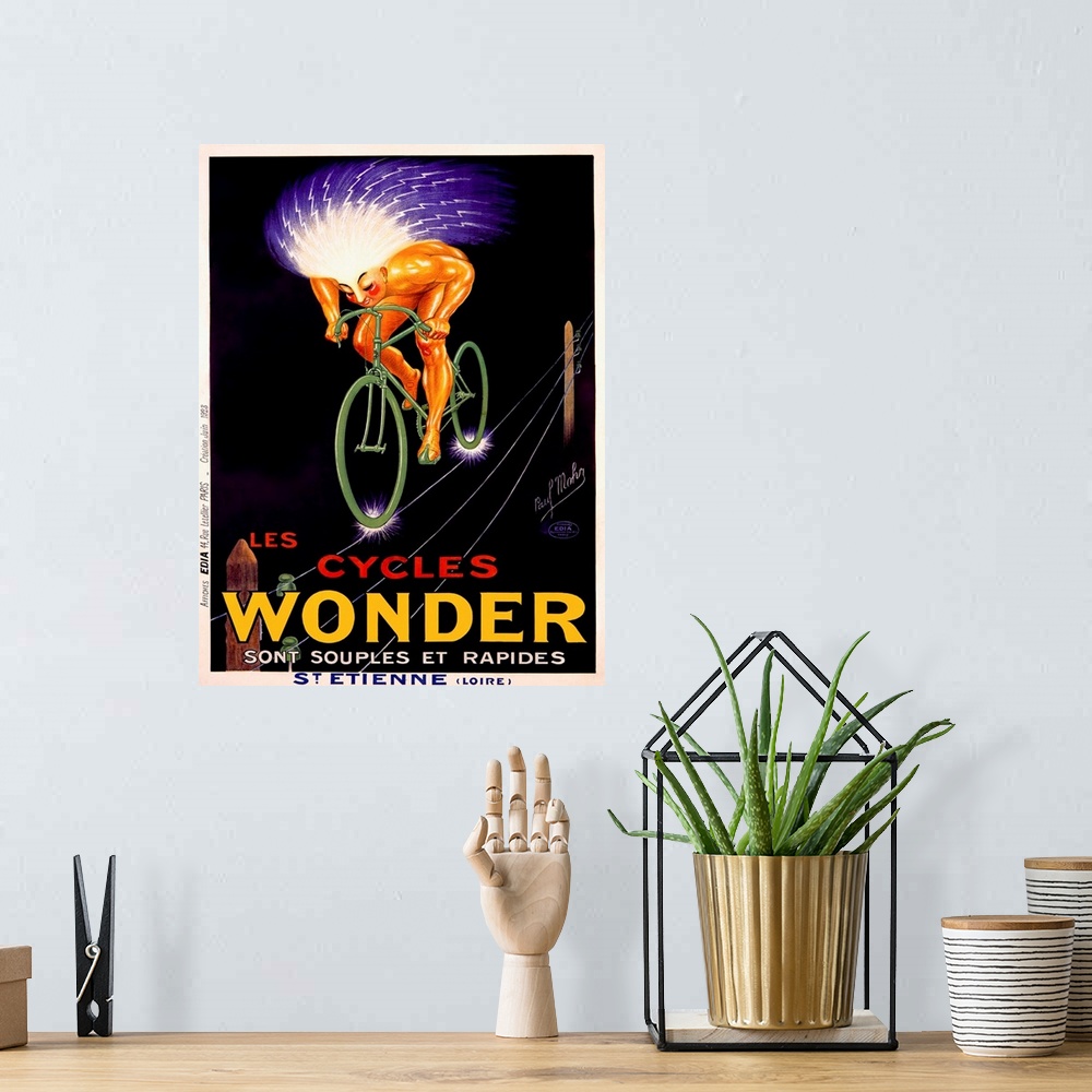 A bohemian room featuring Les Cycles Wonder Vintage Advertising Poster