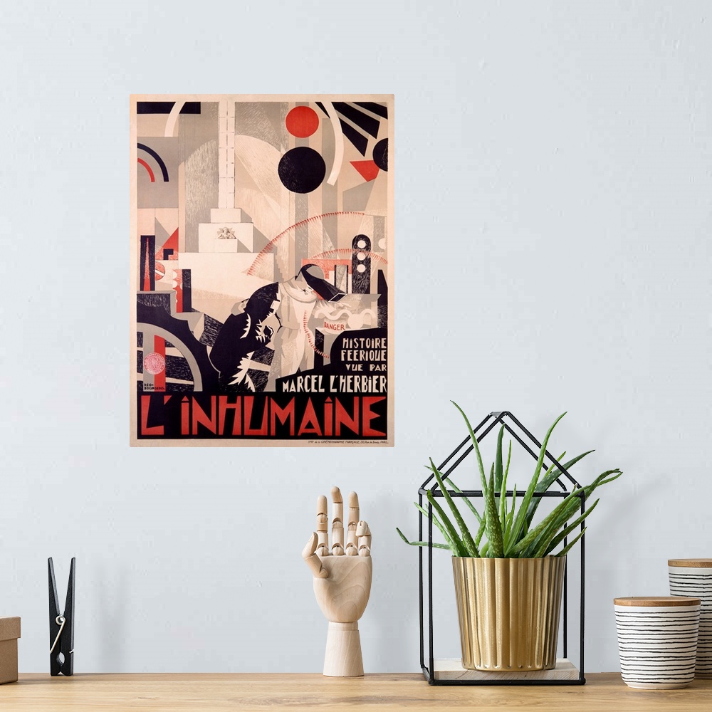 A bohemian room featuring LInhumaine, Vintage Poster