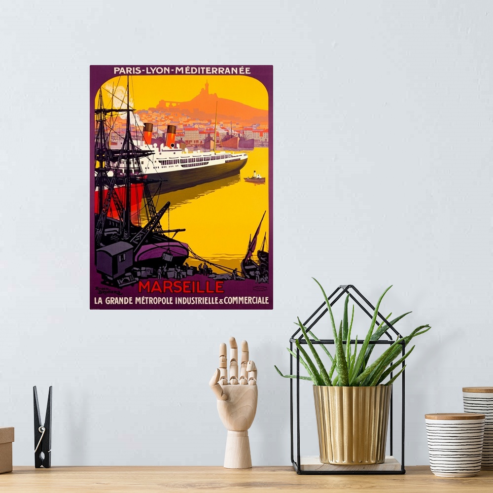 A bohemian room featuring Art Deco style advertising print.  A huge ship with city in the distance and loading dock in the ...