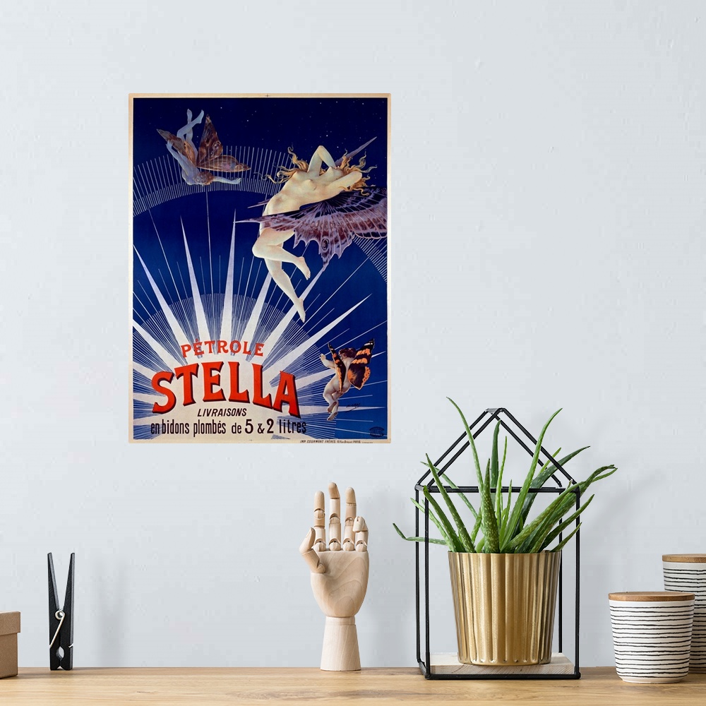 A bohemian room featuring Old poster print advertising an event.  There is an image of three nude bodies with butterfly win...