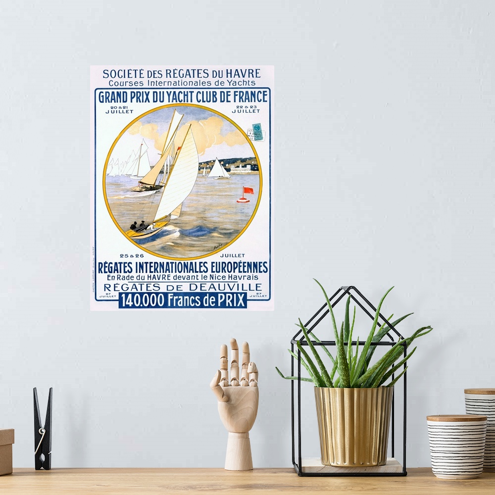 A bohemian room featuring Vintage French poster advertising the Grand Prix du Yacht Club de France with sailboats racing ar...