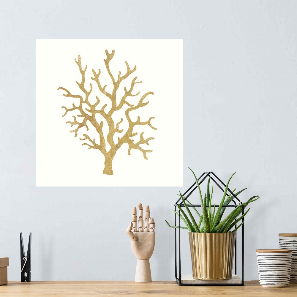 A bohemian room featuring Minimalist artwork of a golden coral outline on off-white.