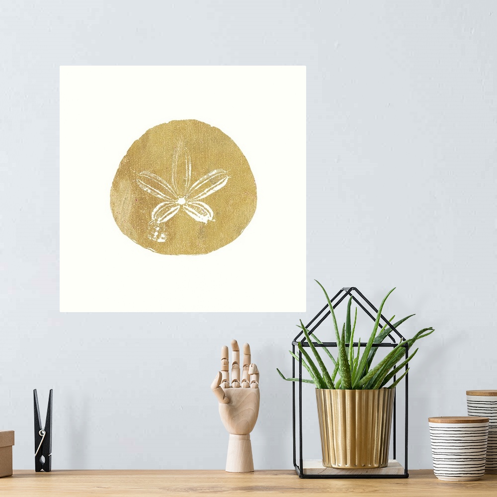 A bohemian room featuring Minimalist artwork of a golden sand dollar outline on off-white.