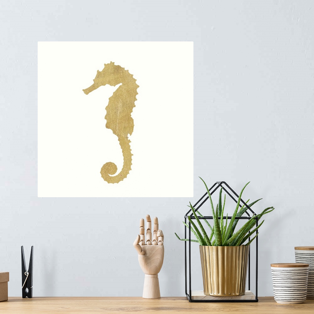 A bohemian room featuring Minimalist artwork of a golden seahorse outline on off-white.