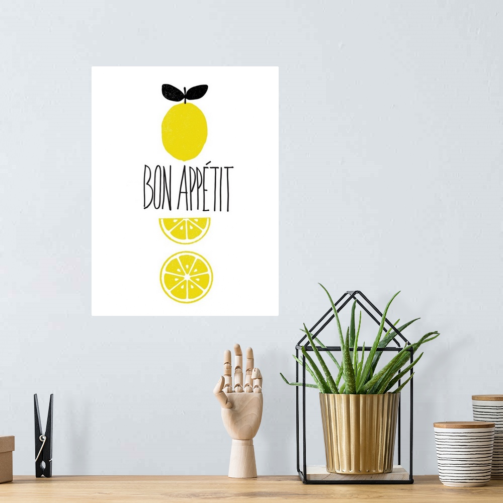 A bohemian room featuring "Bon Appetit" written in the center of a white background with illustrations of lemons.