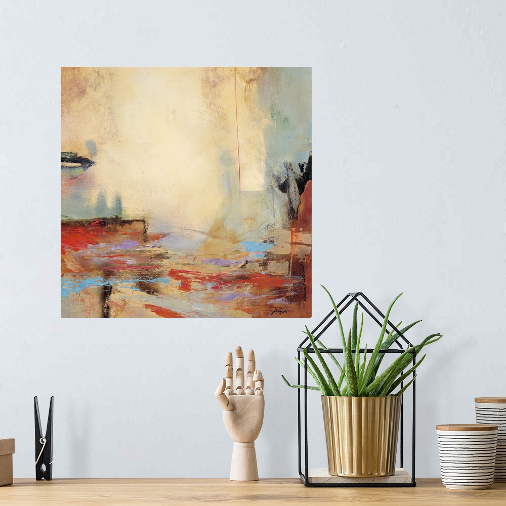 A bohemian room featuring Contemporary abstract artwork using warm and cool tones in a harsh jagged motion.