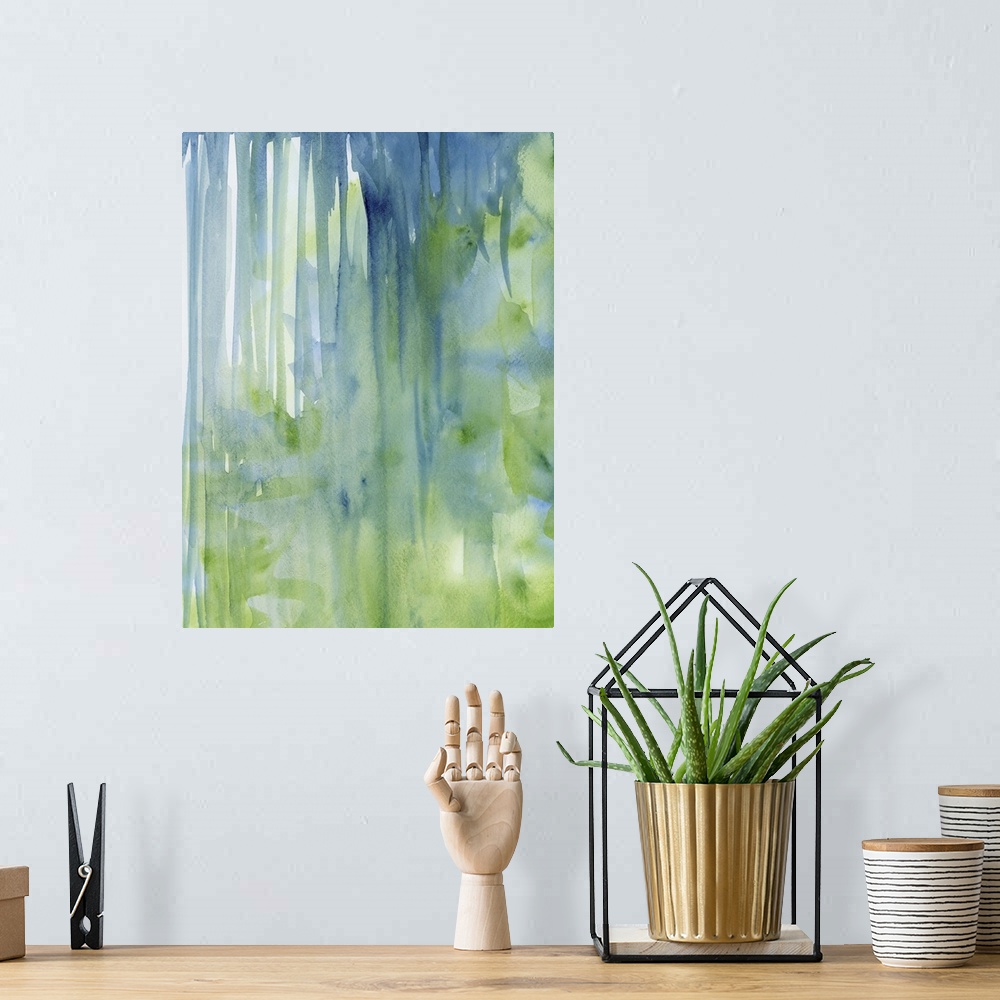 A bohemian room featuring Contemporary abstract painting using green and blue watercolor drips.