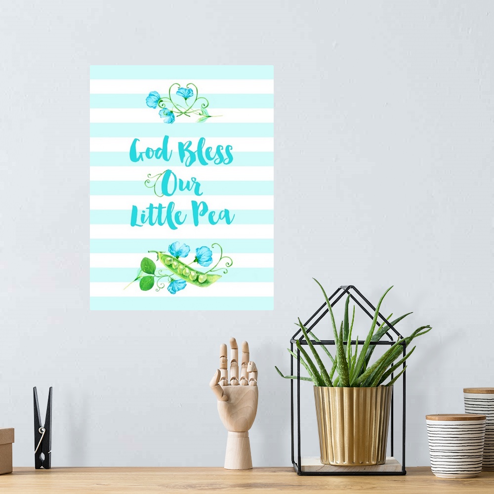 A bohemian room featuring "God Bless Our Little Pea" in blue, white, and green