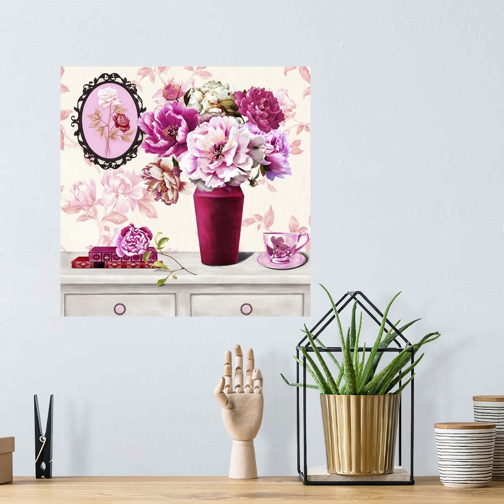 A bohemian room featuring Contemporary vibrant home decor artwork of a floral still-life in bright pink tones.