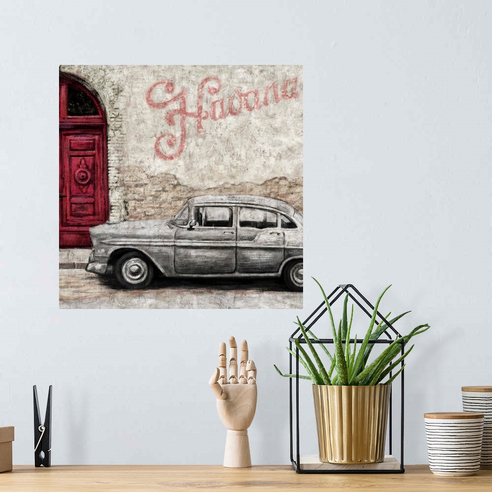 A bohemian room featuring Square decor of an illustrated street scene in Havana, Cuba with a vintage car, red door, and wal...