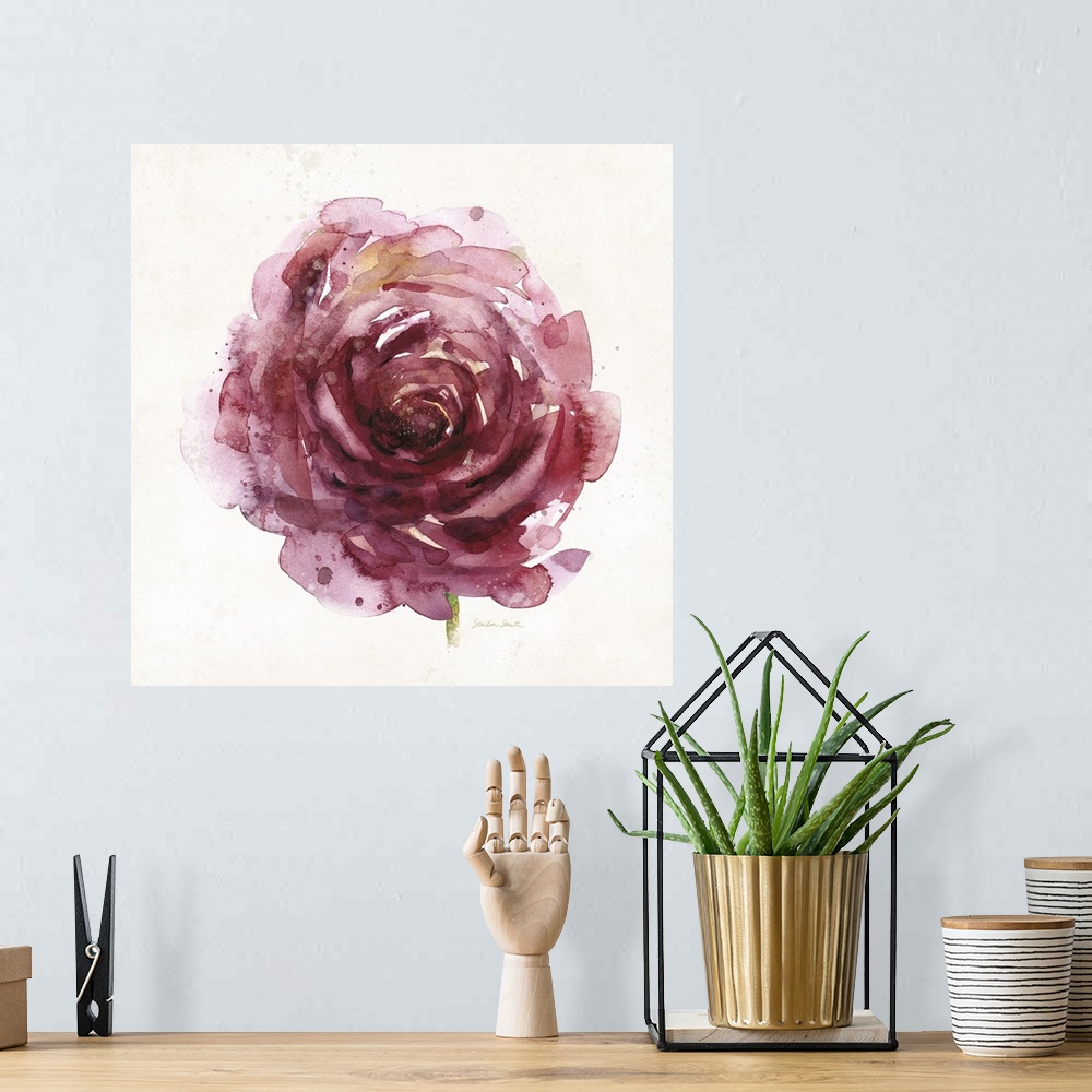 A bohemian room featuring Watercolor painting of a round red rose.