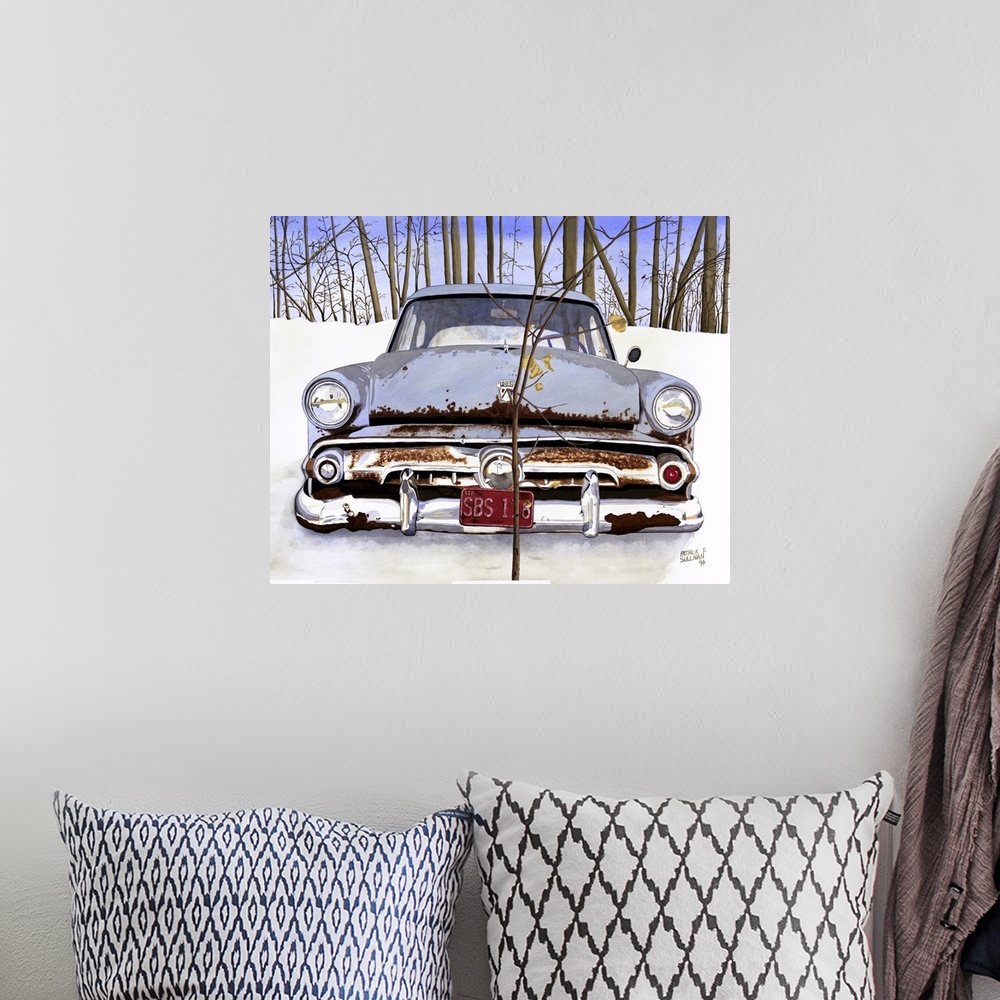 A bohemian room featuring An old beat up vintage ford car in the snow with trees in the background.