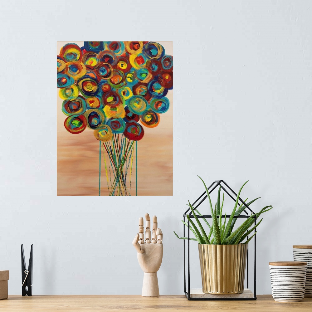 A bohemian room featuring A contemporary abstract painting of a bouquet of colorful flowers in a vase against a light brown...