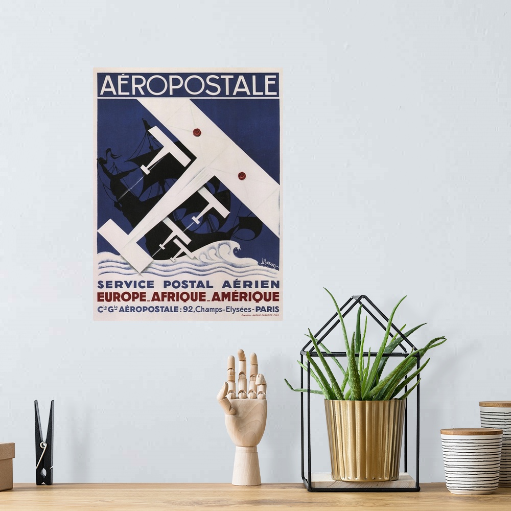 A bohemian room featuring Vintage poster advertisement for Aeropostale.