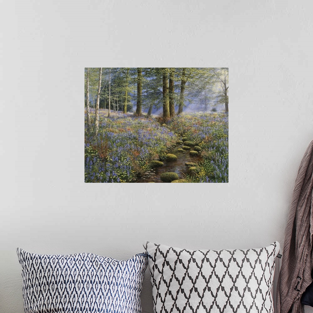A bohemian room featuring Rocky stream running through woods and field of purple salvia.