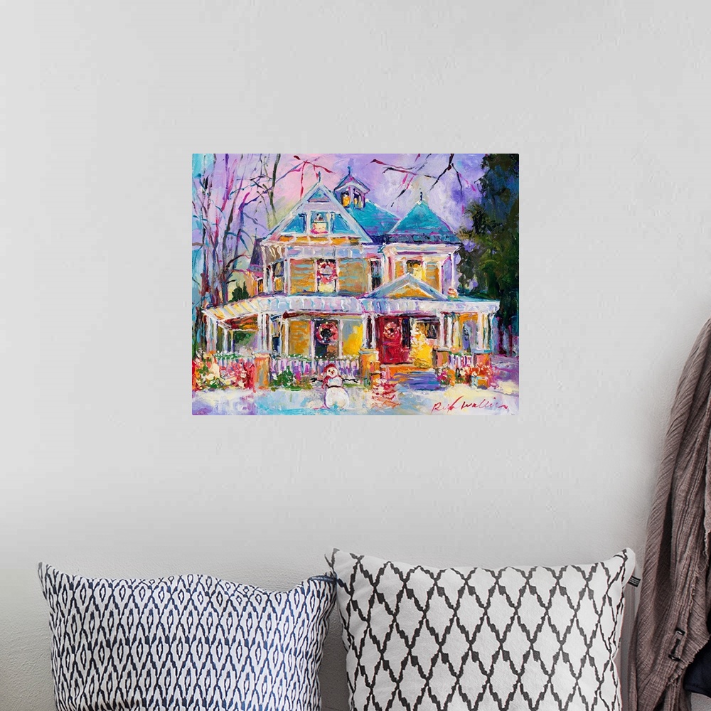 A bohemian room featuring Colorful abstract painting of a snow covered house decorated for Christmas with a snowman in the ...