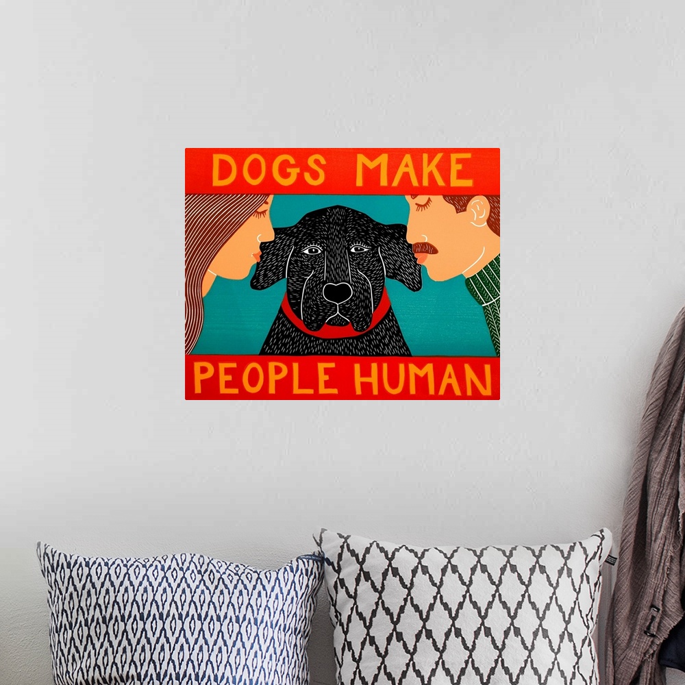 A bohemian room featuring Illustration of a man and a woman kissing their black lab on each ear with the phrase "Dogs Make ...