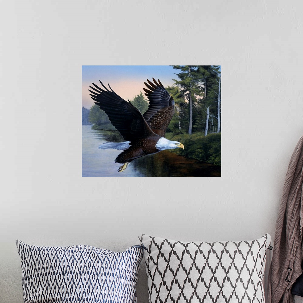 A bohemian room featuring An eagle flying over the water.