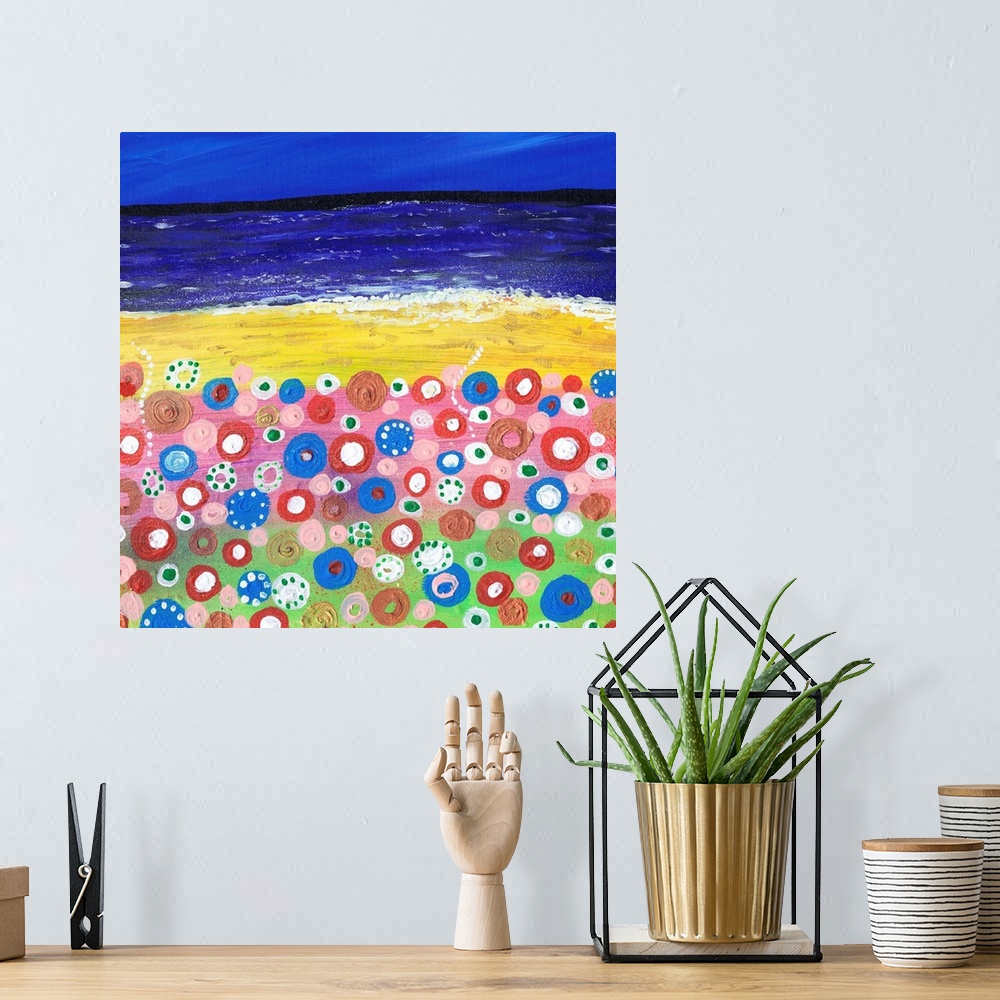 A bohemian room featuring A painting of wildflowers on the beach.