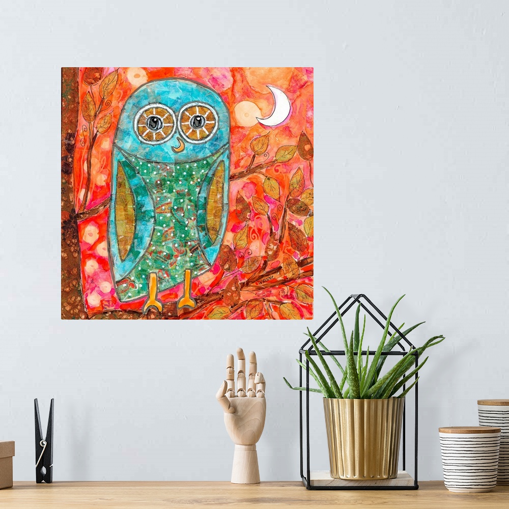 A bohemian room featuring A blue owl with big eyes sitting in a tree with the moon behind.