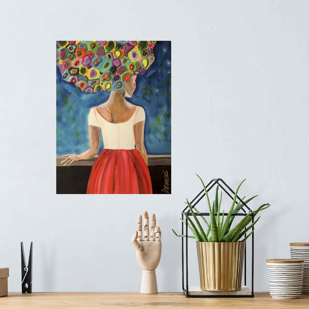 A bohemian room featuring Contemporary painting of a woman with a a giant hairstyle in vibrant colorful shapes.
