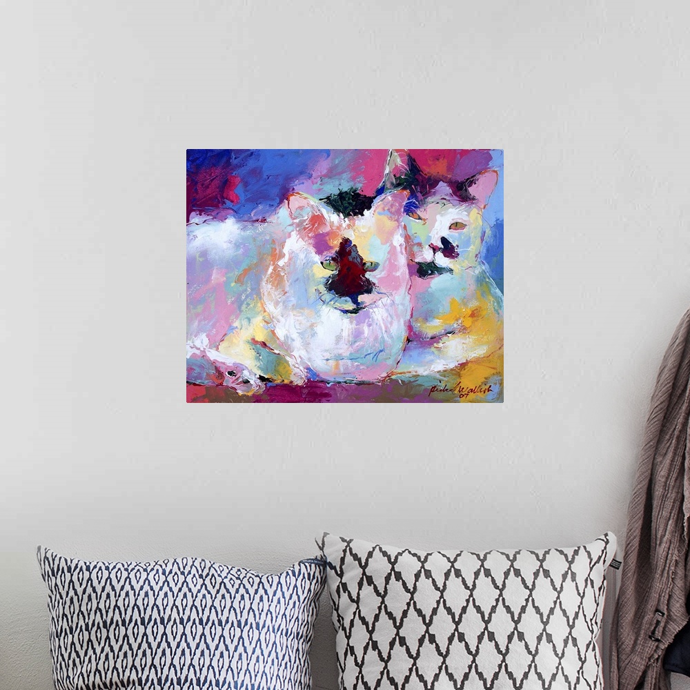 A bohemian room featuring Contemporary vibrant colorful painting of two white cats laying together.