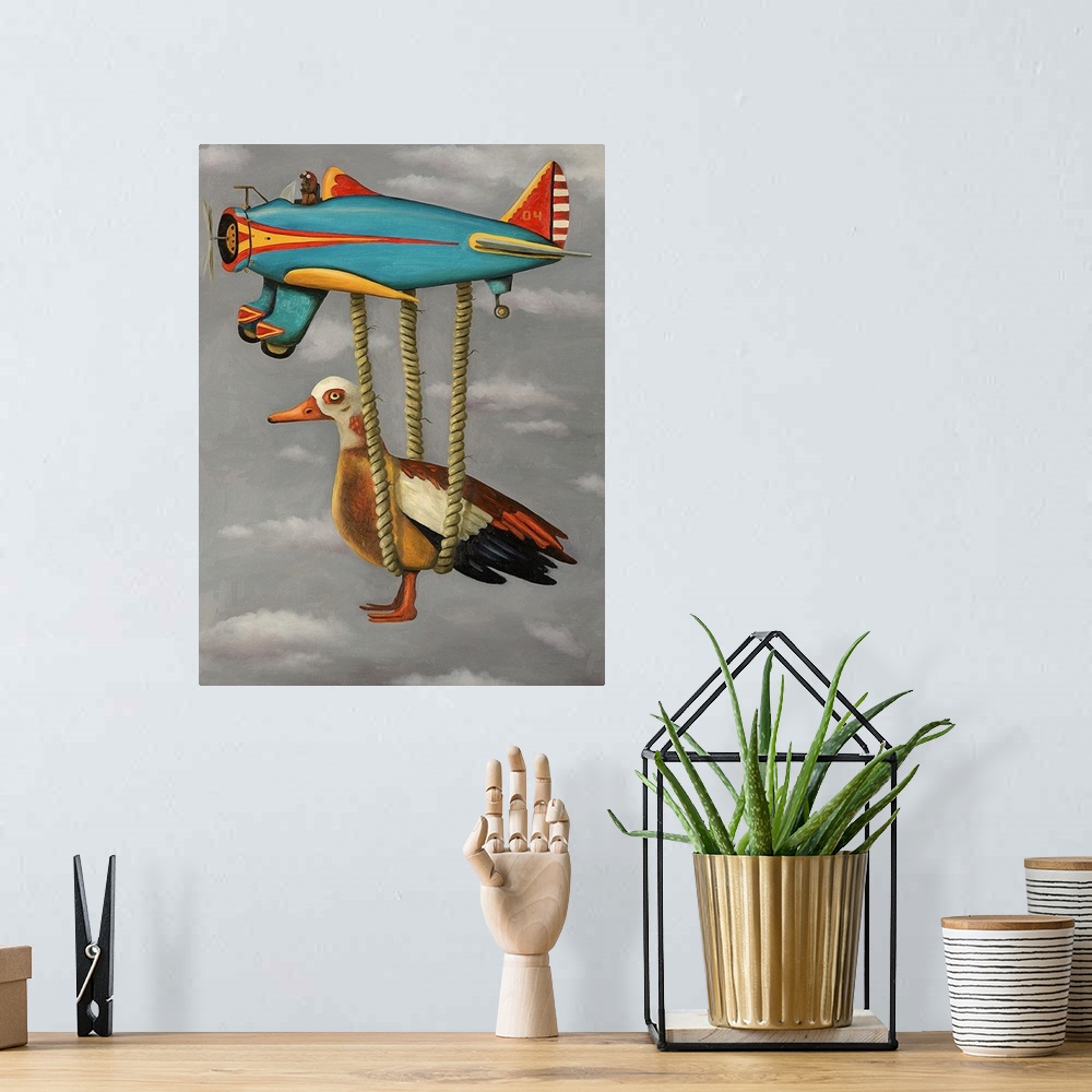 A bohemian room featuring Surrealist painting of a duck being carried by a toy plane.