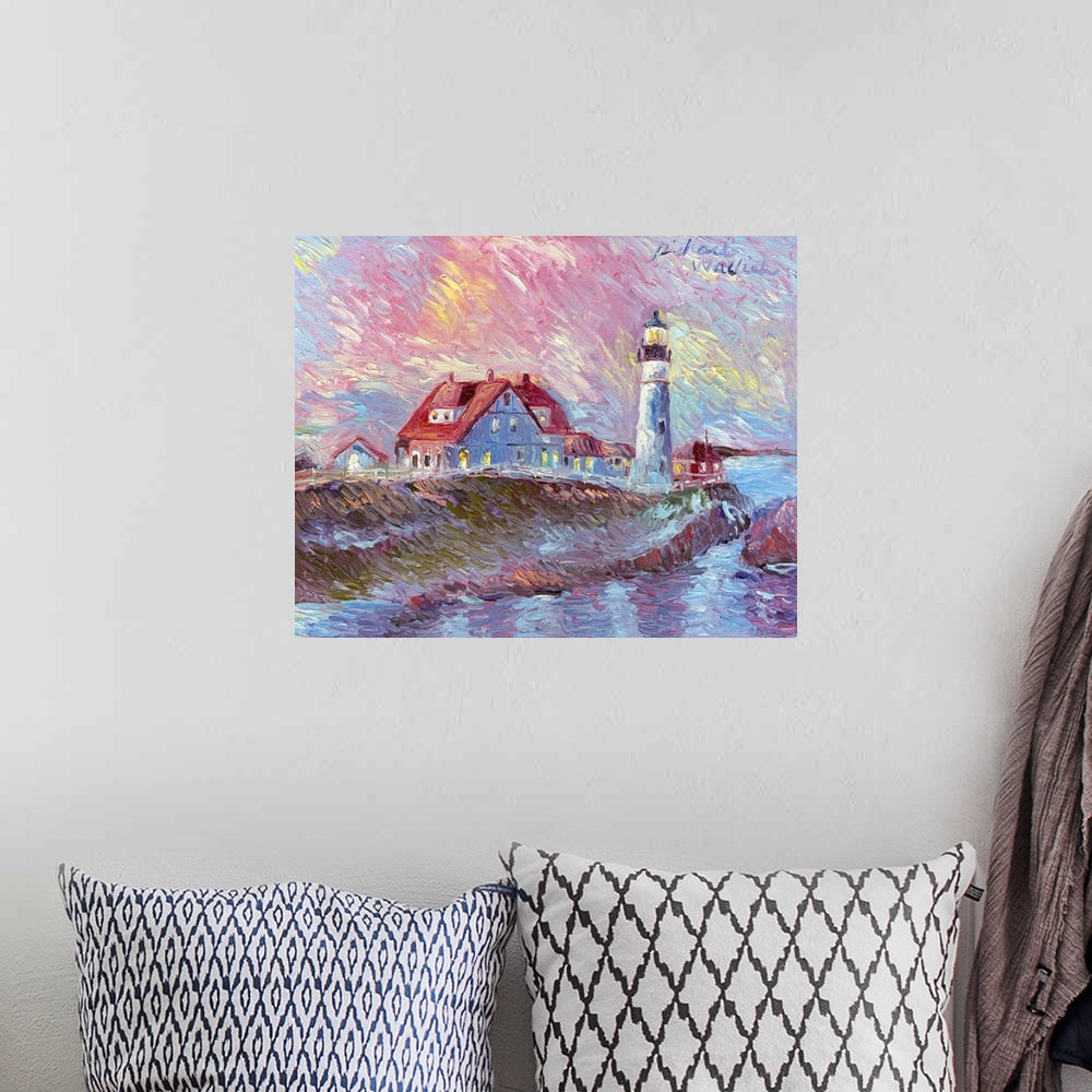 A bohemian room featuring Sun setting over lighthouse and houses on a cove by the ocean.
