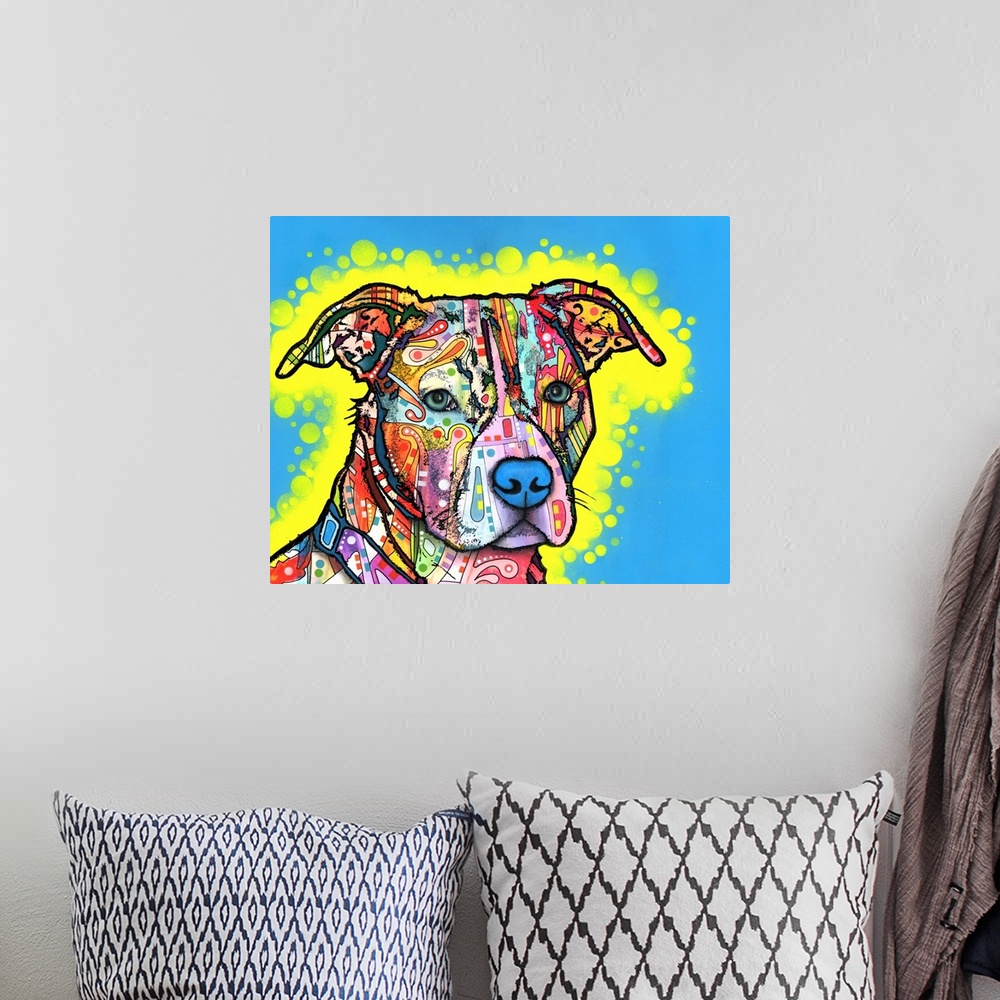 A bohemian room featuring Playful painting of a colorful pit bull with graffiti-like designs on a blue background with a ye...